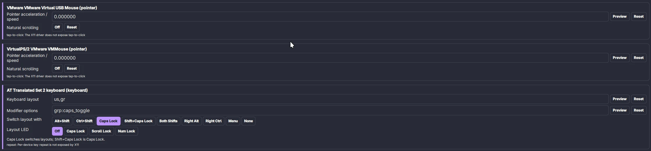 Το Settings > Input μετά: μία κάρτα ανά συσκευή, με τα νέα κουμπιά εναλλαγής διάταξης και LED