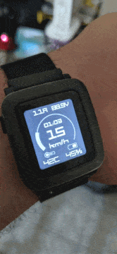 A Pebble Time Steel with current and voltage on top and the time inside the arc, next to EUC World